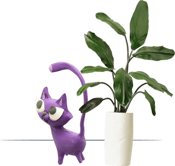Clay cat with plant