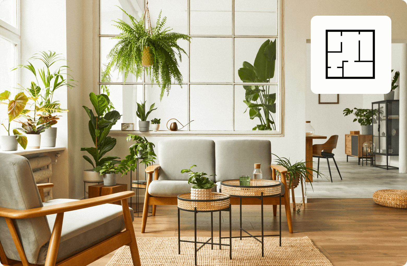 A living room with wood floor, nordic forniture and lots of plants